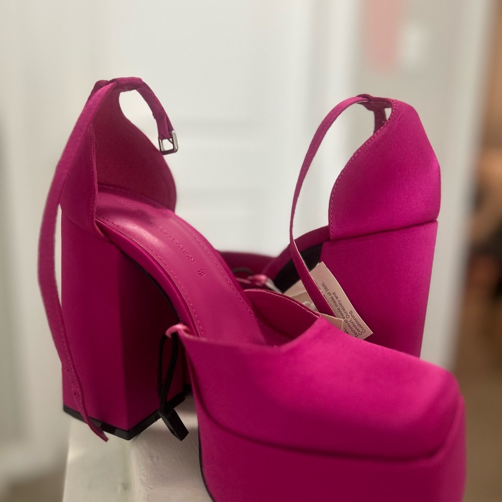 Hot pink sky-high platform heels w/ankle straps. Size 5. New with tags.